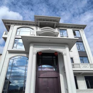 陇南白麻别墅外墙干挂石材效果示例