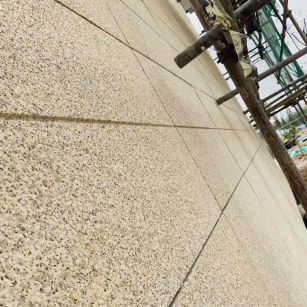 陇南 黄金麻花岗岩荔枝面外墙干挂石材效果示例