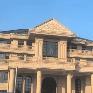 陇南黄金麻别墅外墙干挂石材效果示例